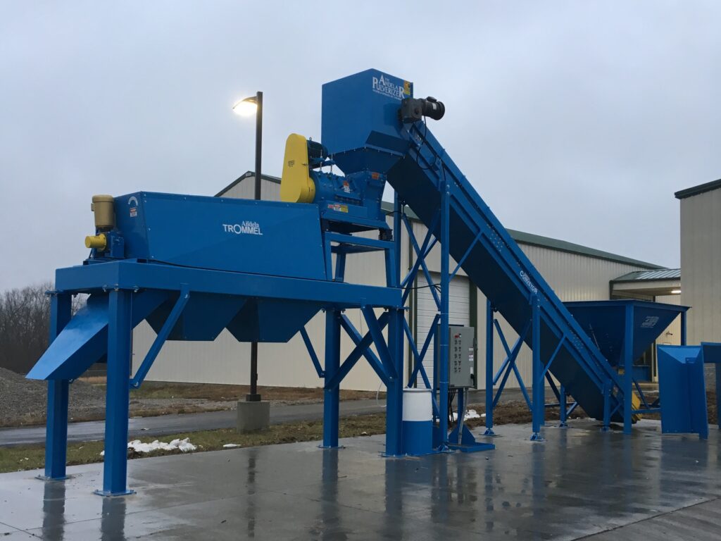 image of big blue glass crushing machine from Andela Products