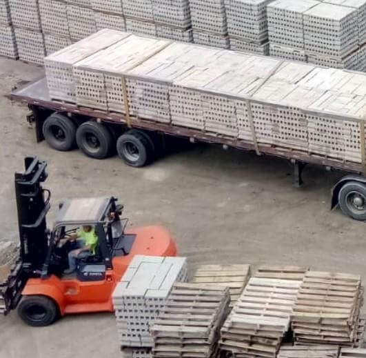 pallets of concrete blocks loaded onto trailer