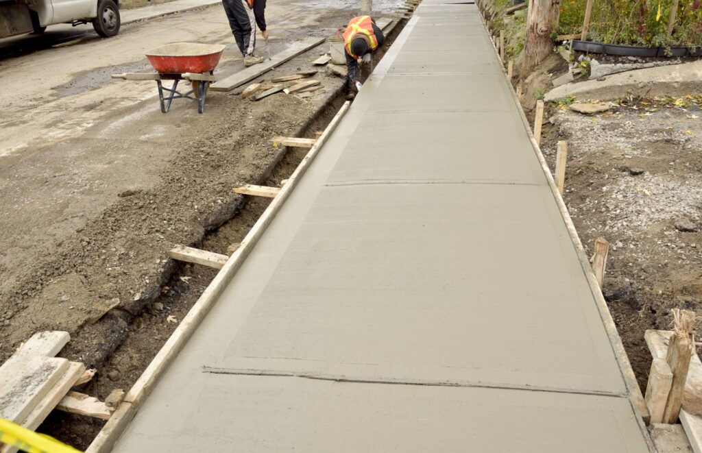 Sidewalk made from crushed glass sand and concrete