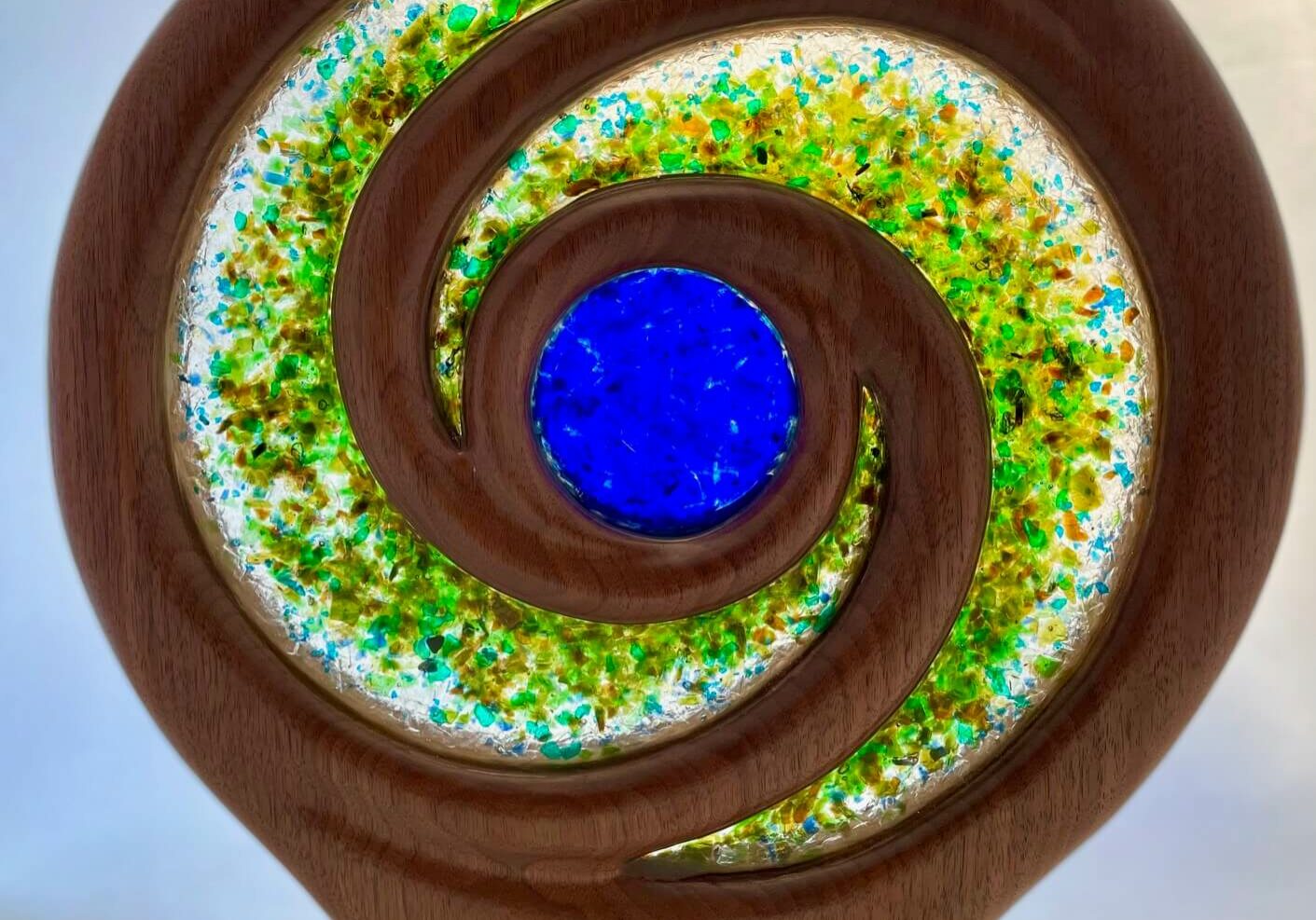 Beautiful green and blue glass sand aggregate artwork